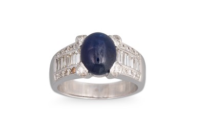 Lot 249 - A DIAMOND AND SAPPHIRE RING, the cabochon...