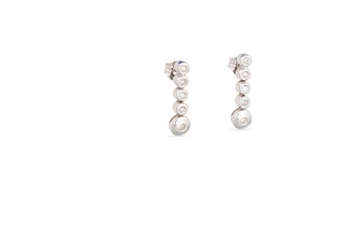 Lot 250 - A PAIR OF DIAMOND DROP EARRINGS, comprising...