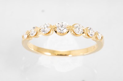 Lot 182 - A DIAMOND FIVE STONE RING, the brilliant cut...