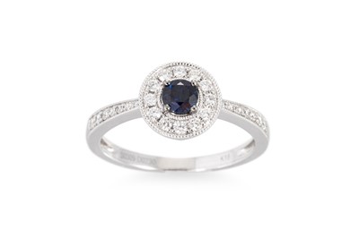 Lot 185 - A SAPPHIRE AND DIAMOND CLUSTER RING, of...