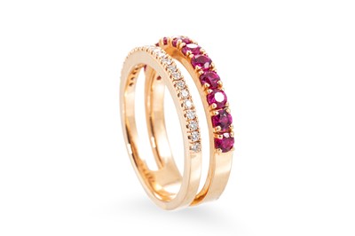 Lot 187 - A RUBY AND DIAMOND RING, comprising a row of...