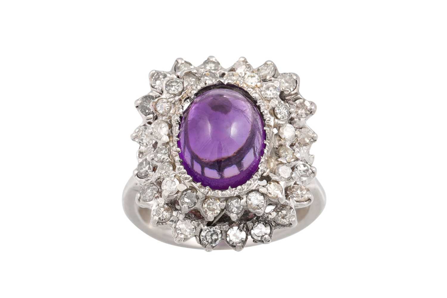 Lot 49 - A DIAMOND AND AMETHYST CLUSTER RING, the...