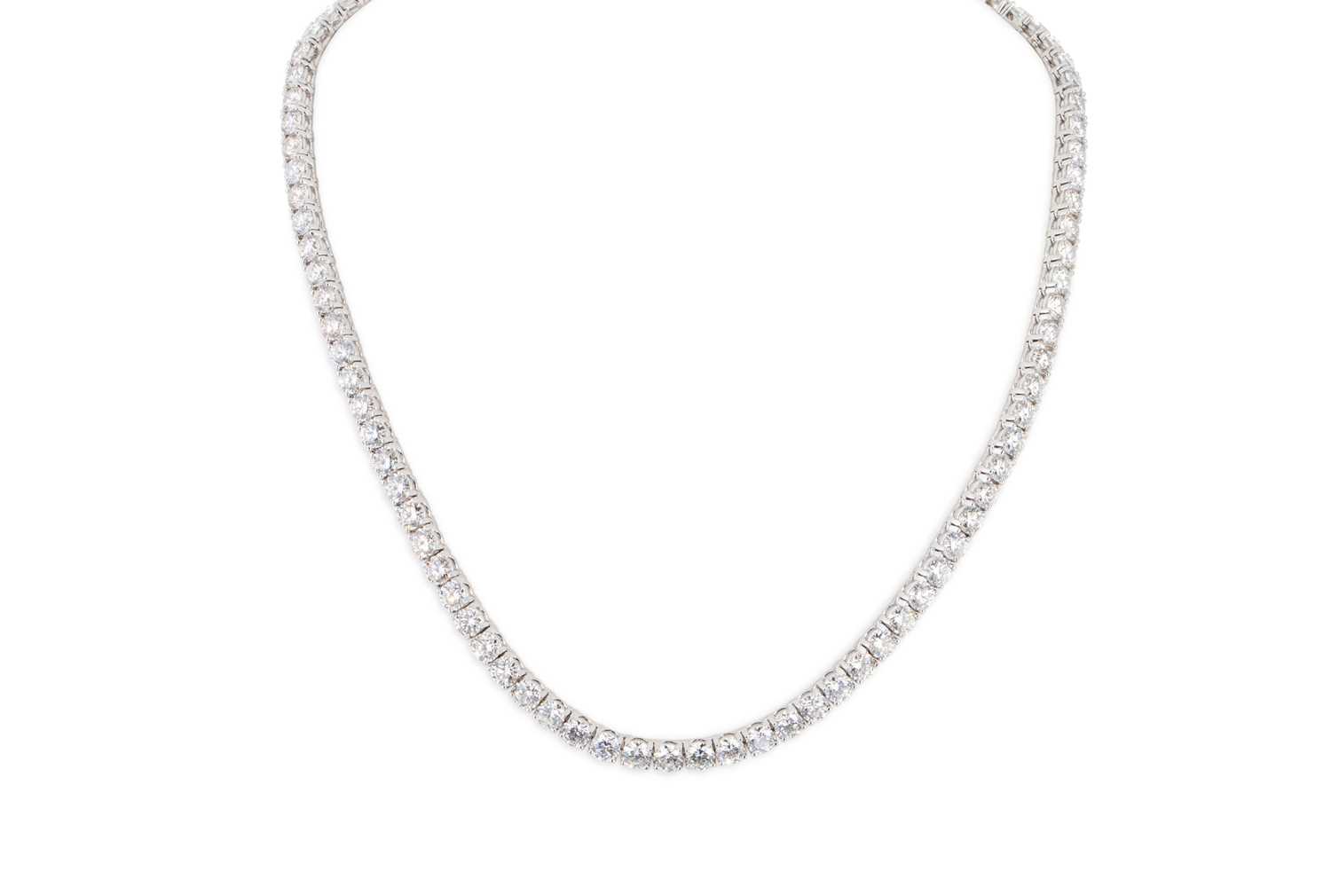 Lot 238 - A FINE QUALITY DIAMOND LINE NECKLACE, the...