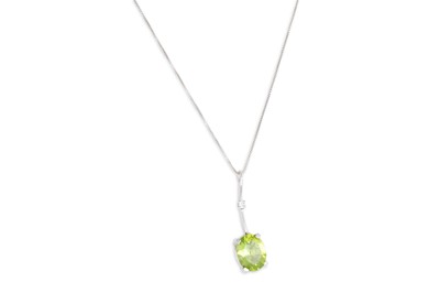 Lot 159 - A PERIDOT AND DIAMOND PENDANT, mounted in 18ct...