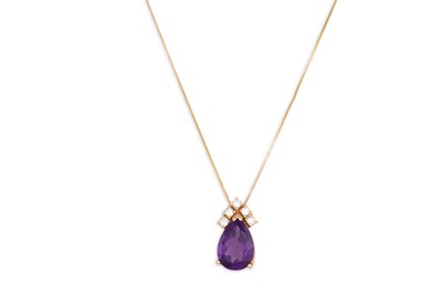 Lot 194 - AN AMETHYST AND DIAMOND PENDANT, the pear...