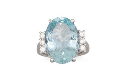 Lot 241 - AN AQUAMARINE AND DIAMOND RING, the oval...