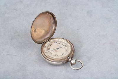 Lot 214 - A WORLD WAR I SILVER CASED ANEROID BAROMETER,...
