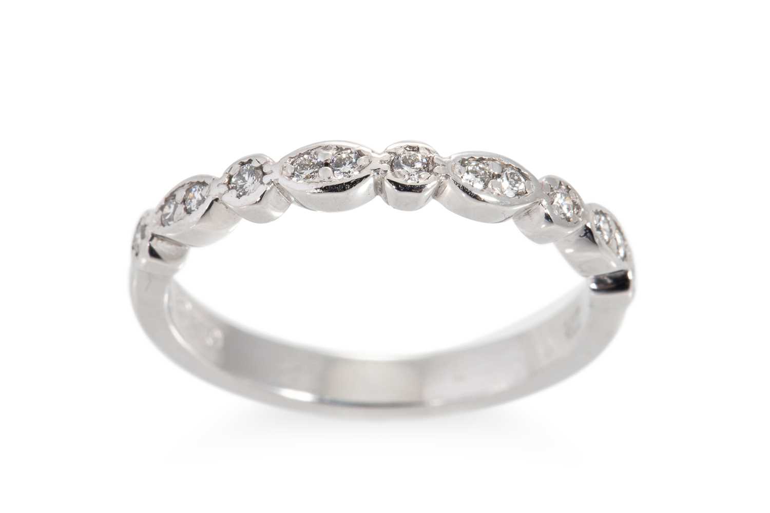 Lot 165 - A DIAMOND SET BAND RING, mounted in 18ct white...