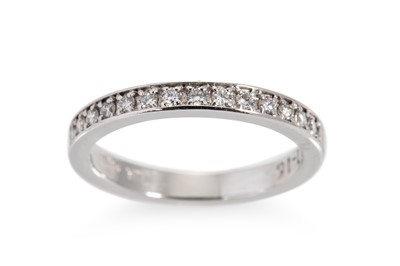 Lot 166 - A DIAMOND HALF ETERNITY RING, the round...