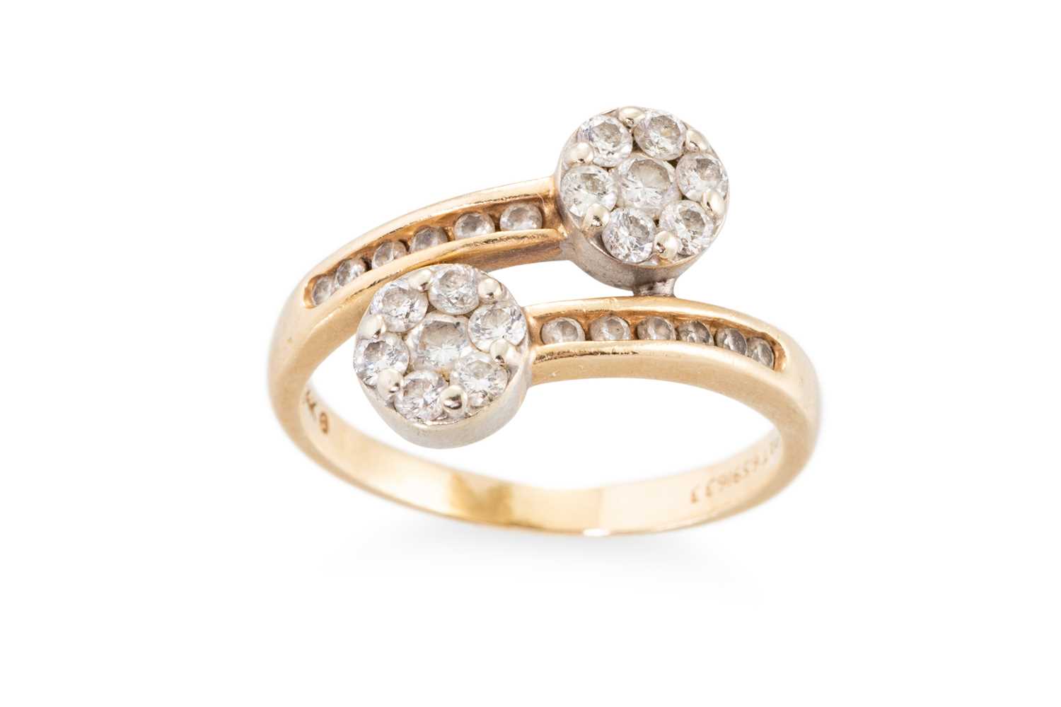 Lot 11 - A DIAMOND SET DOUBLE CLUSTER RING, cross over...