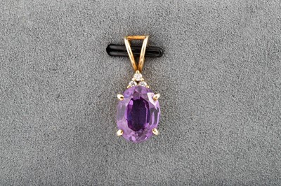 Lot 40 - A PEARL SET PENDANT, mounted in gold, together...