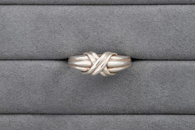 Lot 30 - A SILVER TIFFANY RING, x-shaped design, signed,...