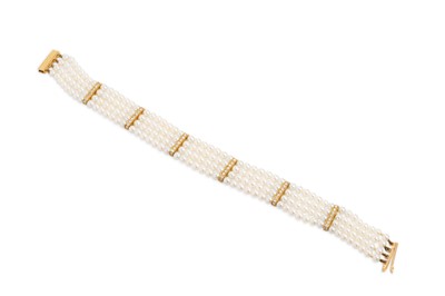 Lot 241 - A FOUR STRANDED PEARL BRACELET, with diamond...