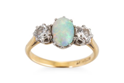 Lot 244 - AN OPAL AND DIAMOND THREE STONE RING, the oval...