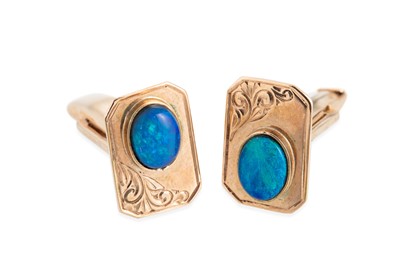 Lot 253 - A PAIR OF OPAL CUFF LINKS, mounted in 9ct gold
