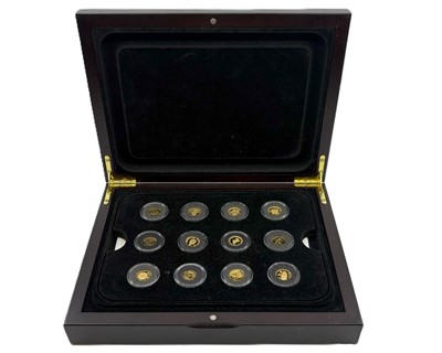 Lot 393 - A CASED COLLECTION OF 12 X 1.24 GOLD COINS,...