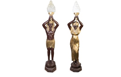 Lot 528 - A COMPANION PAIR OF LATE 20TH CENTURY NUBIAN...