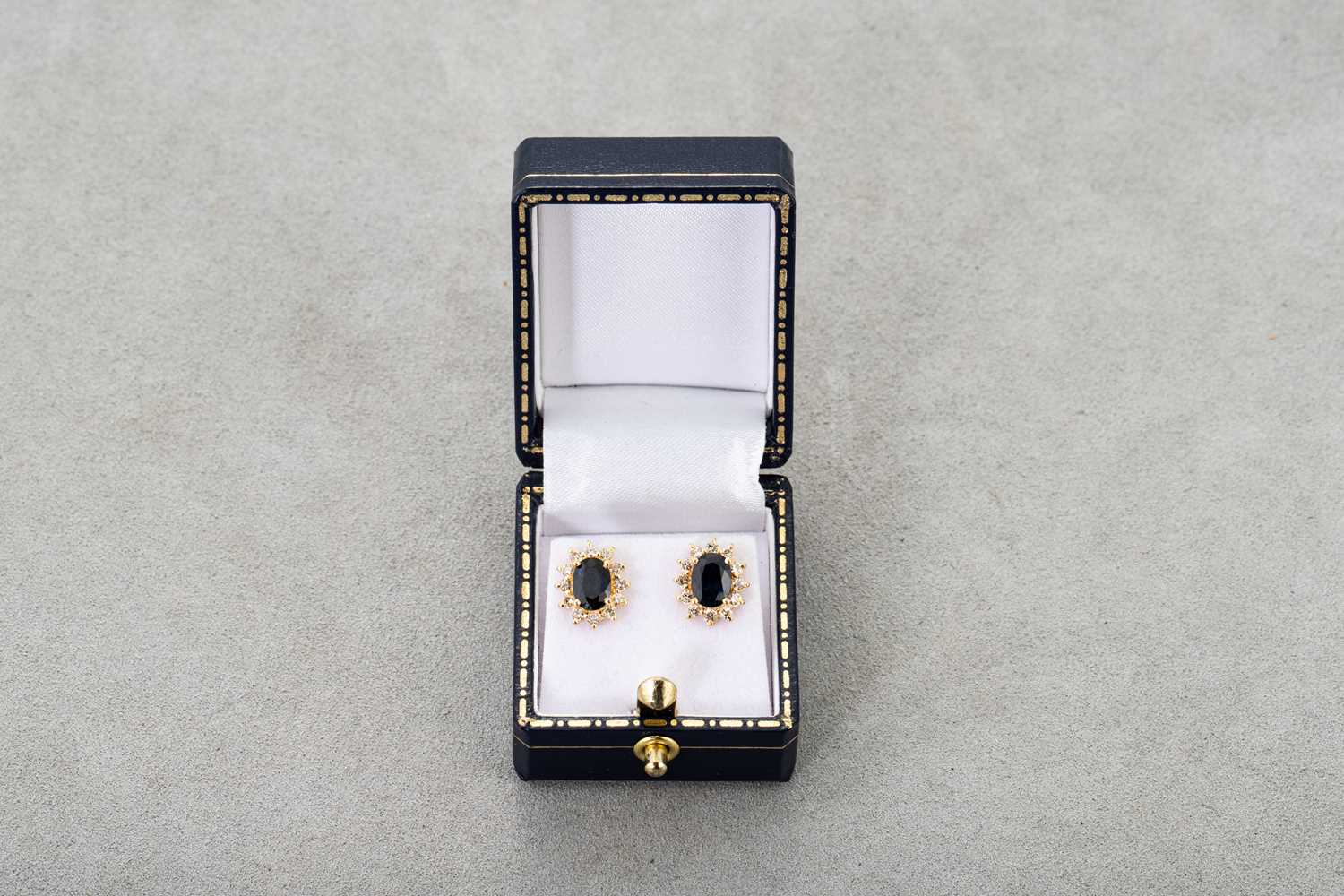 Lot 16 - A PAIR OF DIAMOND AND SAPPHIRE CLUSTER...