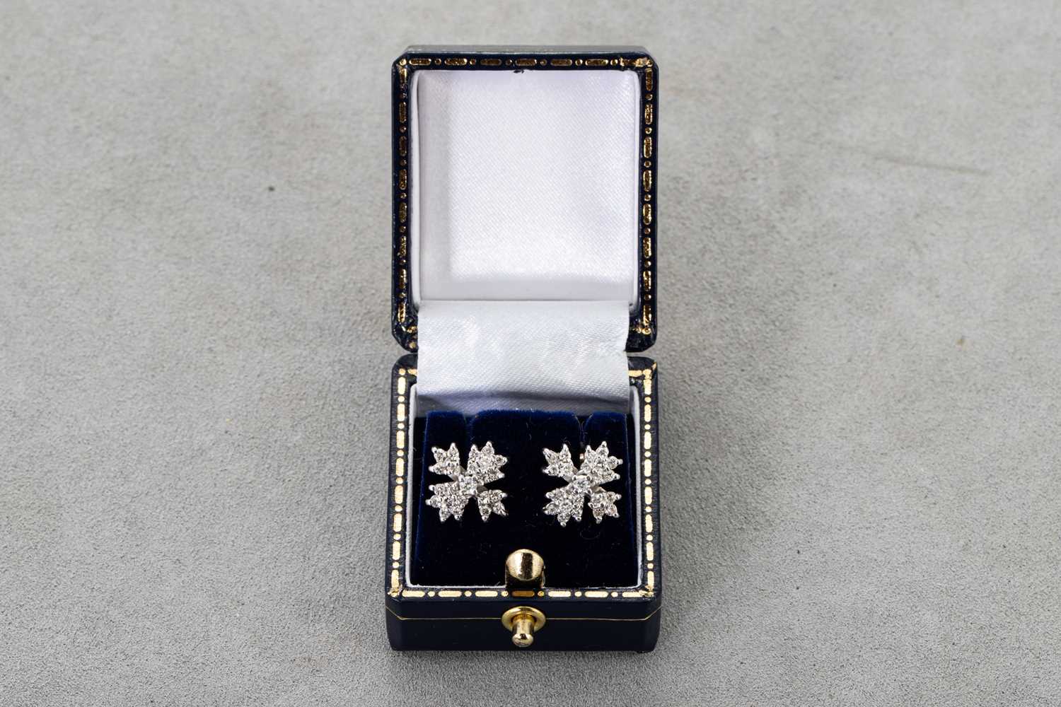 Lot 17 - A PAIR OF DIAMOND CLUSTER EARRINGS, mounted in...