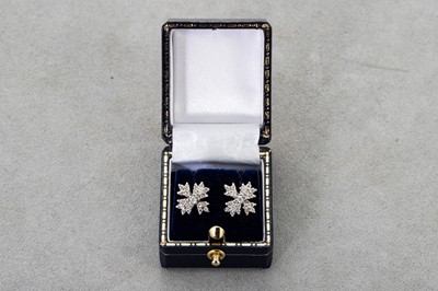 Lot 17 - A PAIR OF DIAMOND CLUSTER EARRINGS, mounted in...