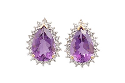 Lot 137 - A PAIR OF AMETHYST EARRINGS, the pear shaped...