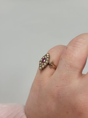 Lot 63 - A PEARL AND RUBY NAVETTE SHAPED RING, the seed...