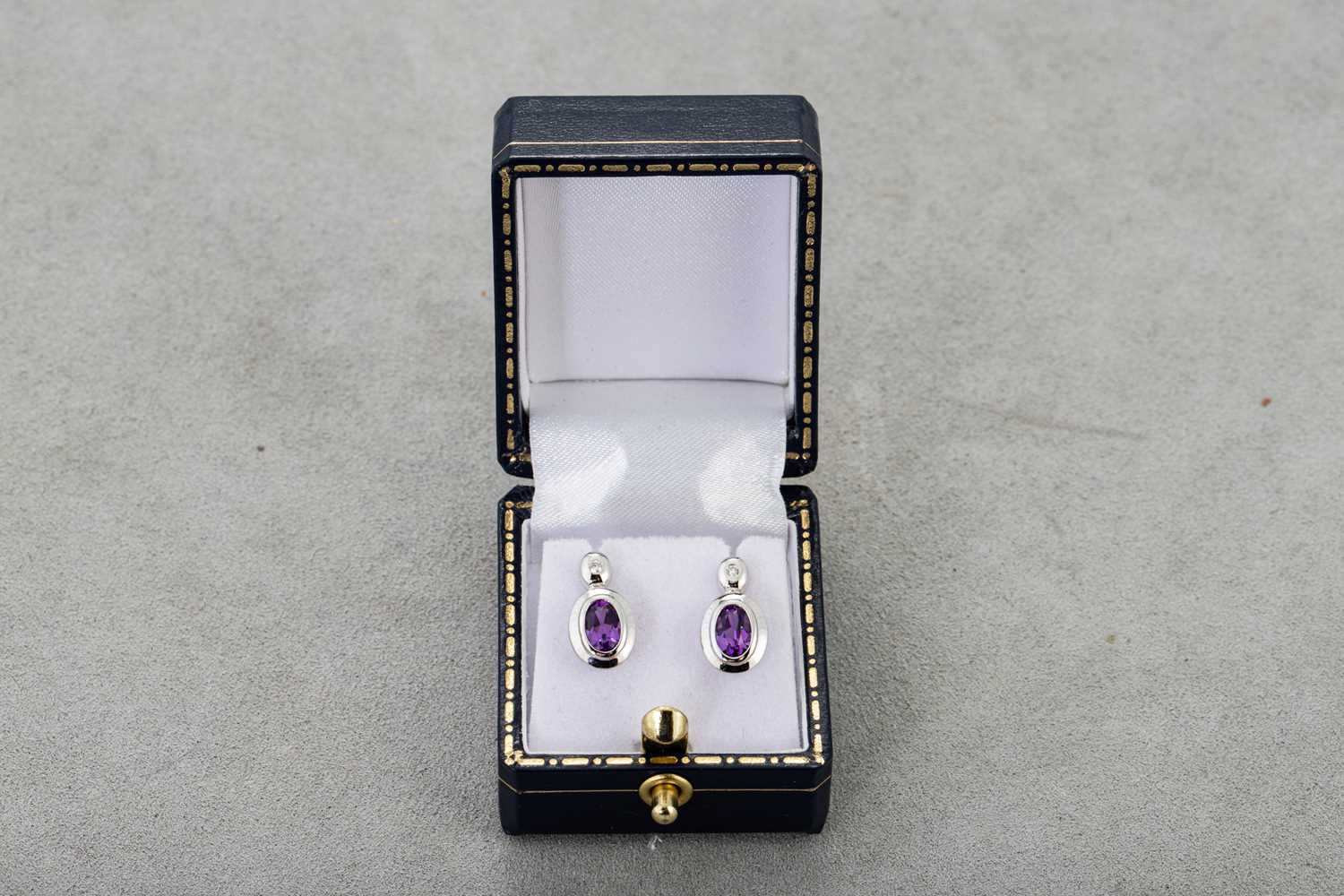 Lot 70 - A PAIR OF AMETHYST AND DIAMOND SET EARRINGS,...