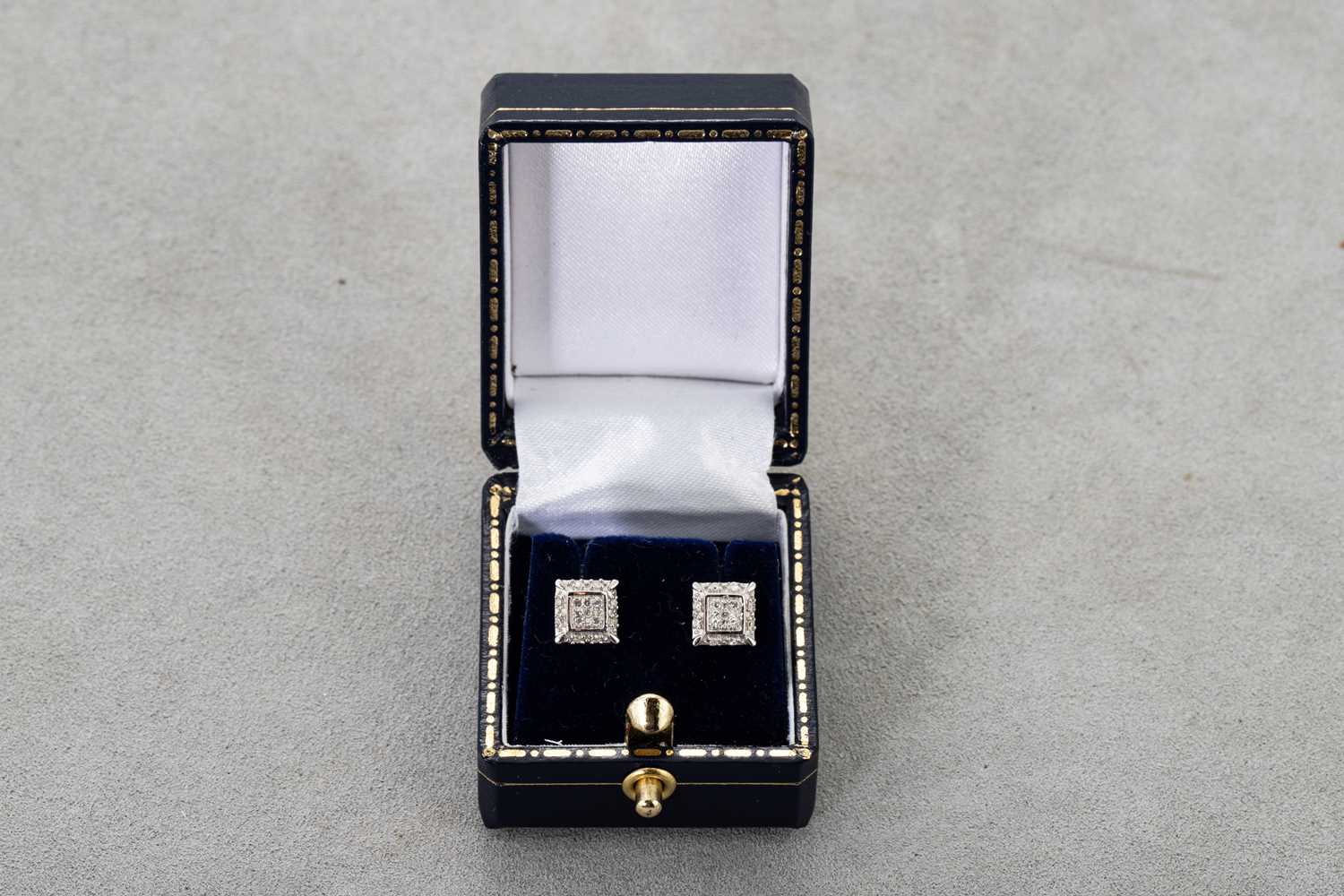 Lot 74 - A PAIR OF DIAMOND CLUSTER EARRINGS, of square...