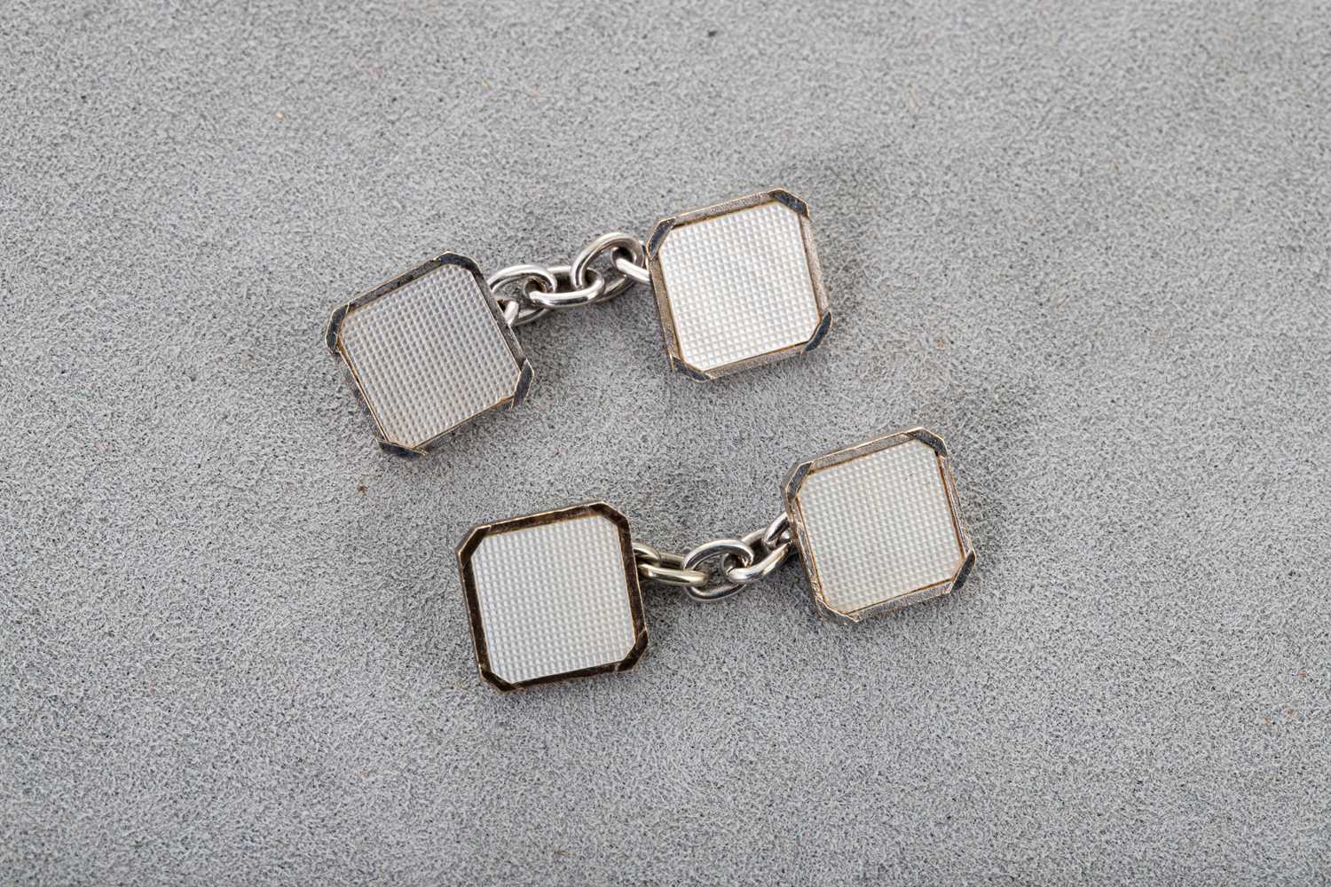 Lot 75 - A PAIR OF 9CT GOLD CUFF LINKS, set with...