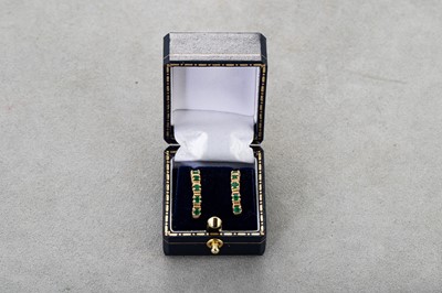 Lot 80 - A PAIR OF EMERALD HALF HOOP EARRINGS, the...