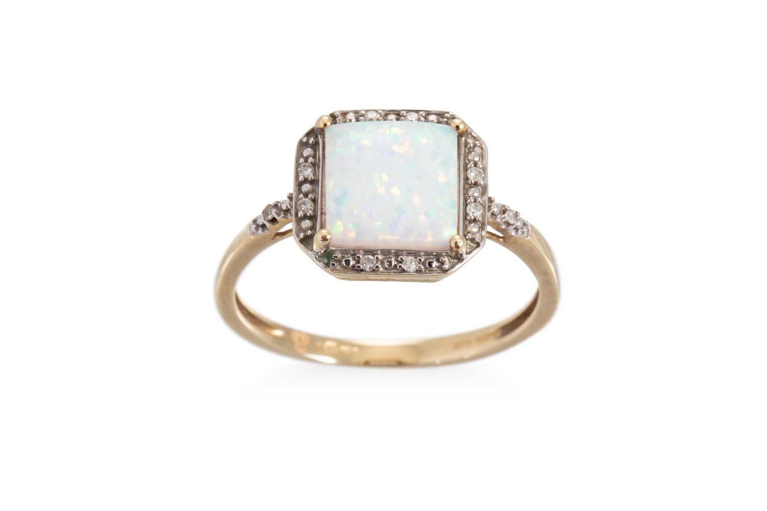 Lot 1 - A SYNTHETIC OPAL AND DIAMOND RING, mounted in...