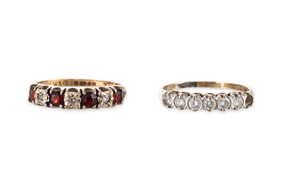 Lot 312 - TWO VINTAGE GOLD GEM SET DRESS RINGS, gross...