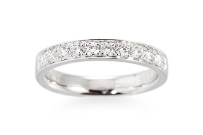 Lot 303 - A DIAMOND HALF ETERNITY RING, the brilliant...