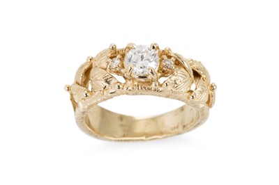 Lot 209 - A DIAMOND RING, the central brilliant cut...