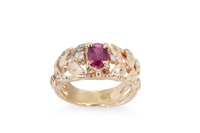 Lot 210 - A RUBY AND DIAMOND RING, the oval ruby and...
