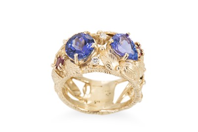 Lot 212 - A TANZANITE RING, mounted in 9ct yellow...