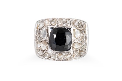 Lot 215 - A SAPPHIRE AND DIAMOND RING, the cushion cut...