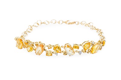 Lot 188 - A YELLOW SAPPHIRE AND DIAMOND SET BRACELET,...