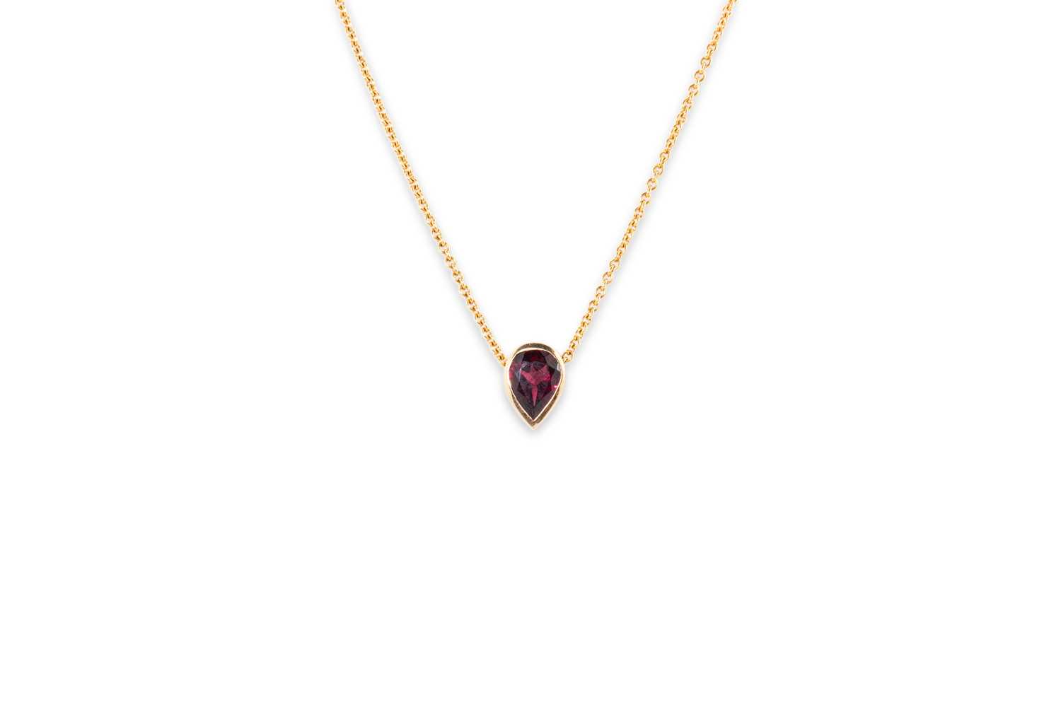 Lot 41 - A GARNET PEAR SHAPED PENDANT, mounted in 18ct...