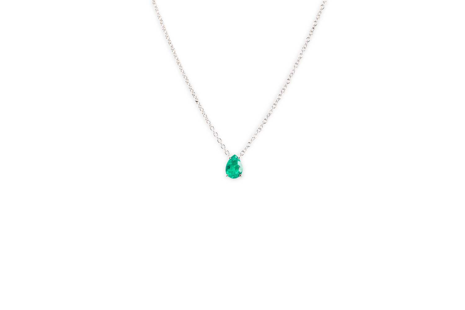 Lot 58 - AN EMERALD PENDANT, the pear shaped stone...