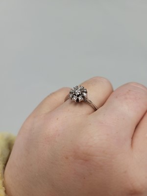 Lot 60 - A DIAMOND CLUSTER RING, mounted in 18ct white...
