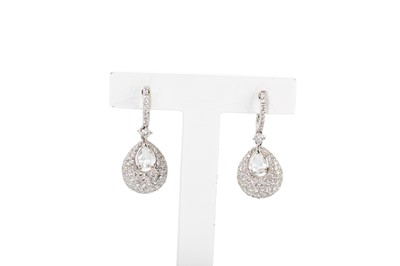 Lot 125 - A PAIR OF DIAMOND SET DROP EARRINGS, the...