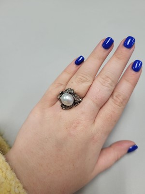 Lot 22 - A VINTAGE PEARL AND ROSE CUT DIAMOND DRESS...