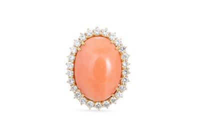 Lot 287 - A CORAL AND DIAMOND CLUSTER RING, the oval...