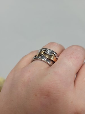 Lot 23 - A GEORG JENSEN 'FUSION' RING, in two colour...