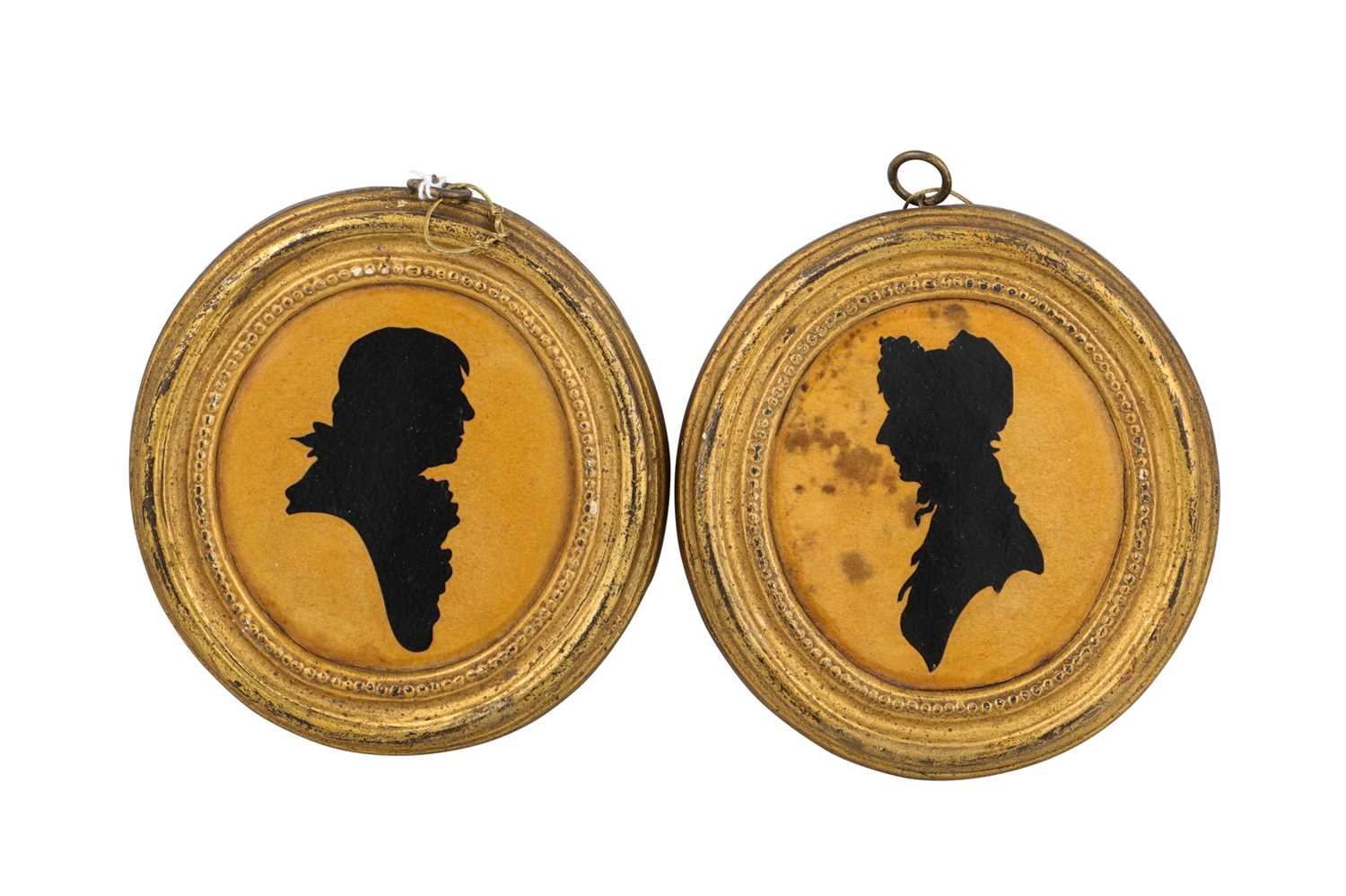 Lot 537 - A PAIR OF ANTIQUE SILHOUETTES ON CARD, in oval...