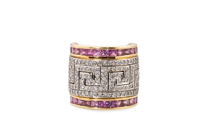 Lot 198 - A DIAMOND AND PINK SAPPHIRE RING, Greek key...
