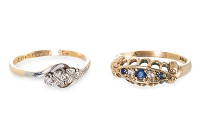Lot 131 - A DIAMOND THREE STONE RING, mounted in 18ct...