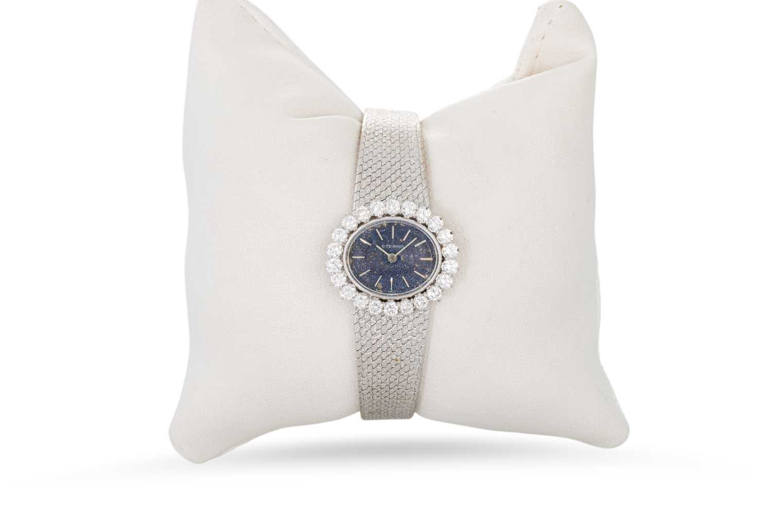 Lot 65 - A LADY'S 18CT WHITE GOLD ETERNA WRISTWATCH,...