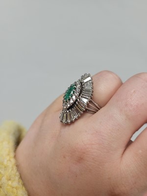 Lot 66 - A DIAMOND AND EMERALD 'BALLERINA' STYLE...